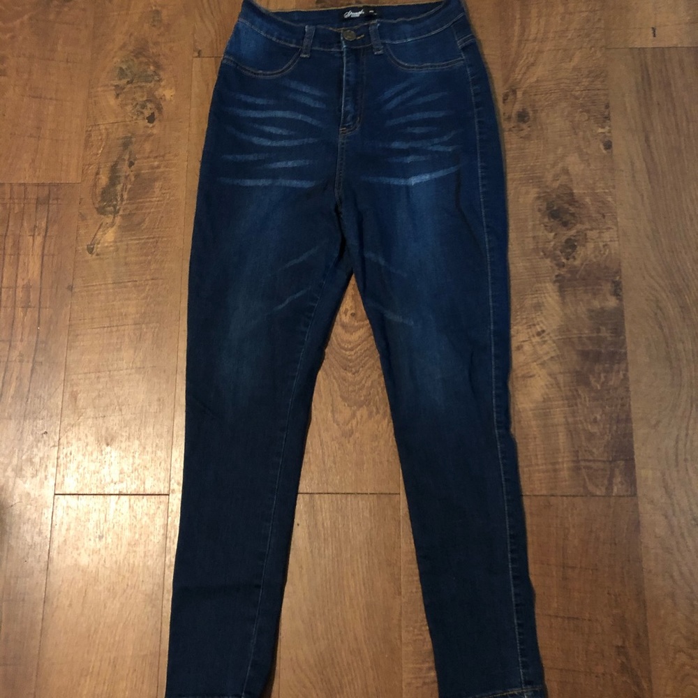 Woman’s Dark Blue Jeans